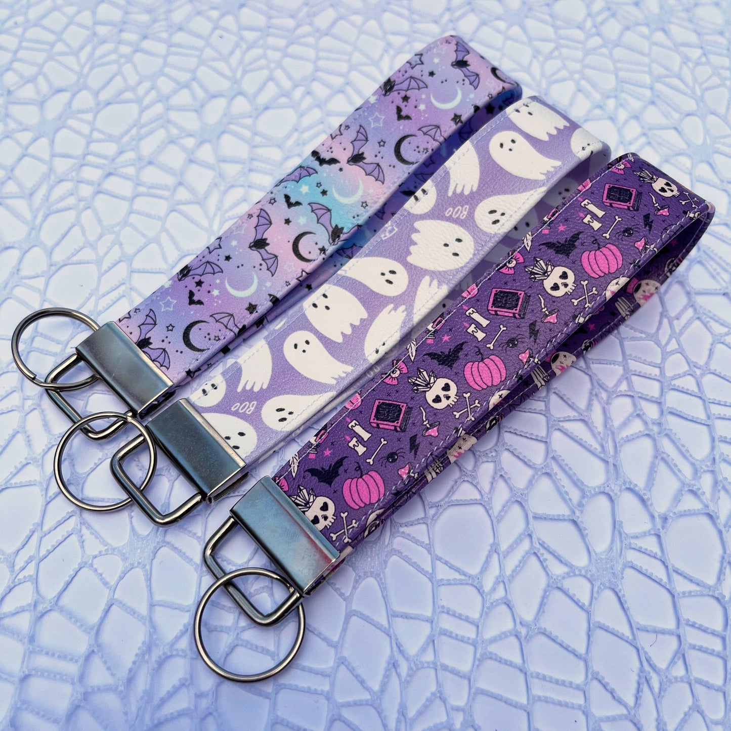 A set of halloween keychain wristlets.