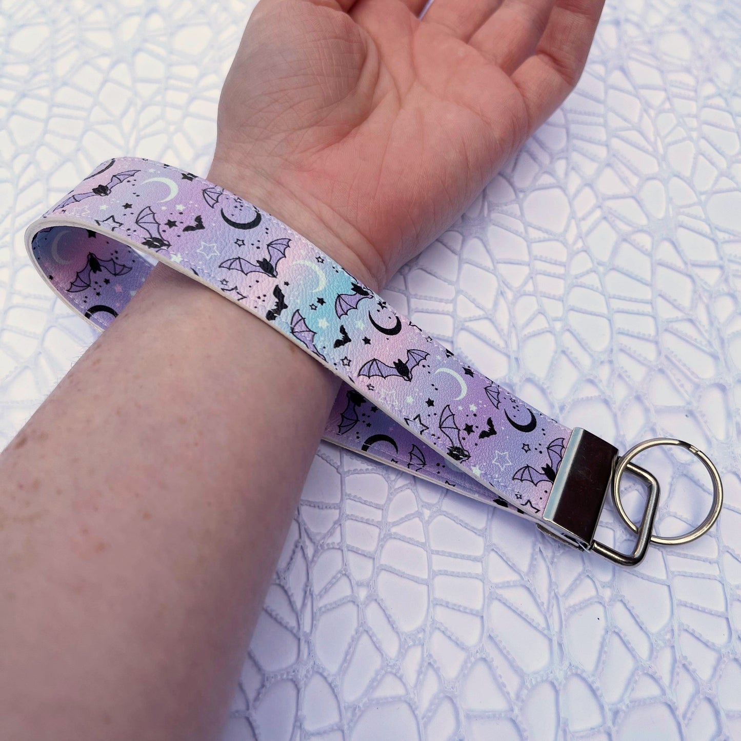 A midnight bats keychain wristlet.