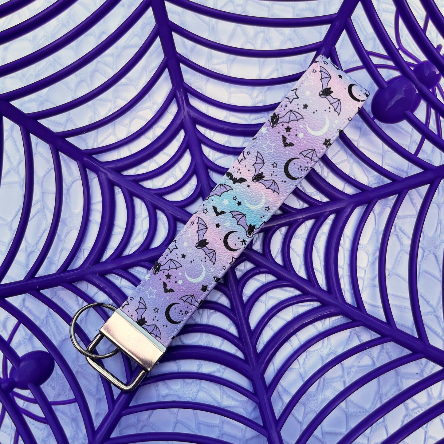 A midnight bats wrist lanyard