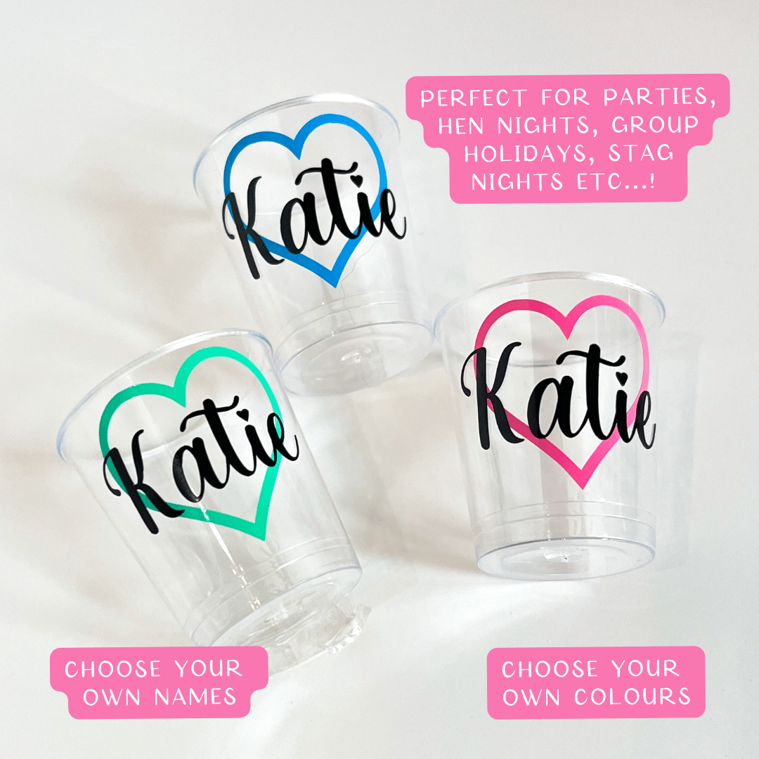 Personalised heart plastic shot glasses.