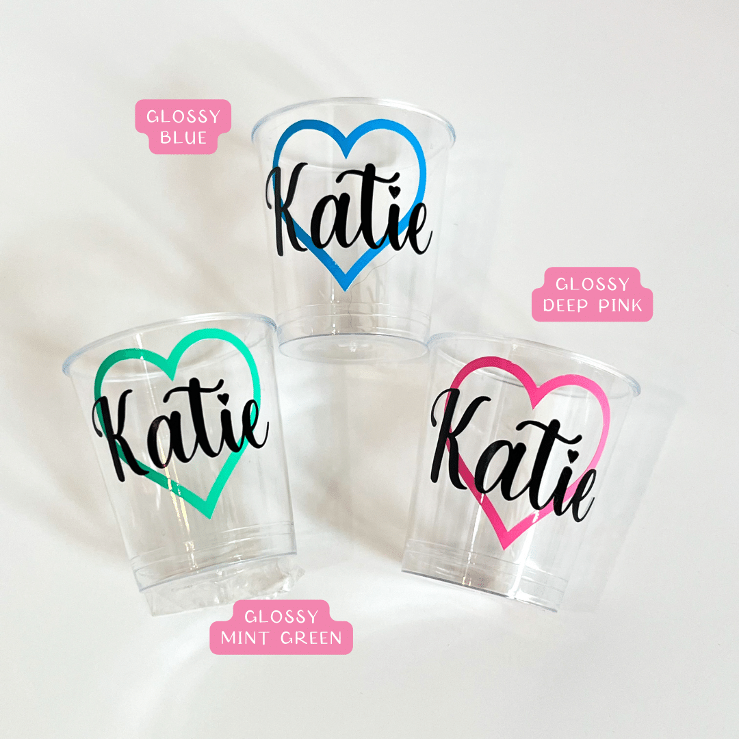 Personalised heart plastic shot glasses.