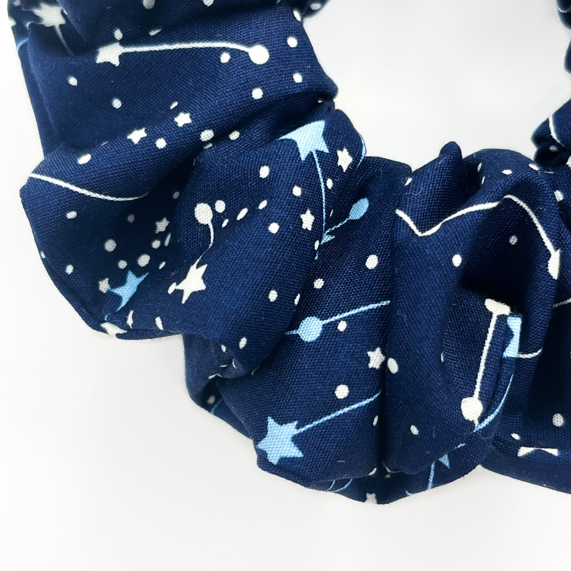 Close up of a constellation scrunchie.