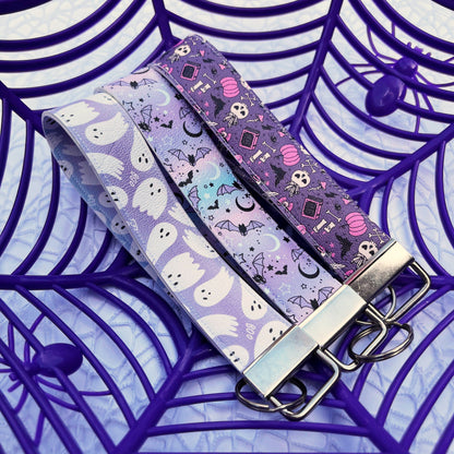 A set of halloween leatherette wrist lanyards.